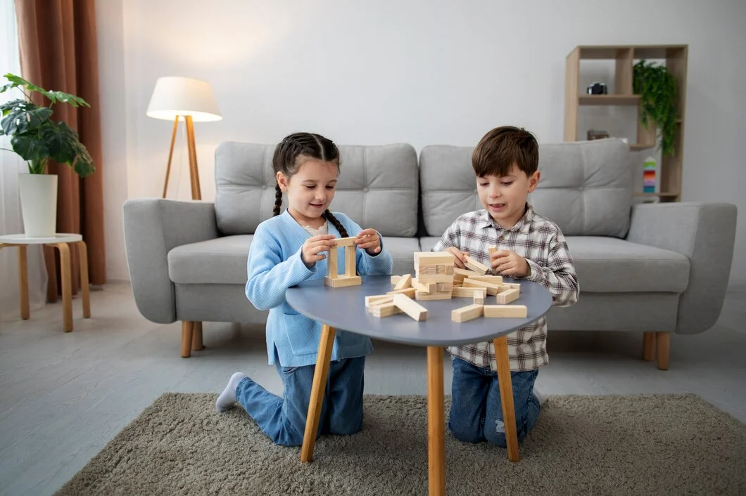 Children playing Jenga and enjoying fun playtime activities at ZPD: Zionsville Pediatric Dentistry