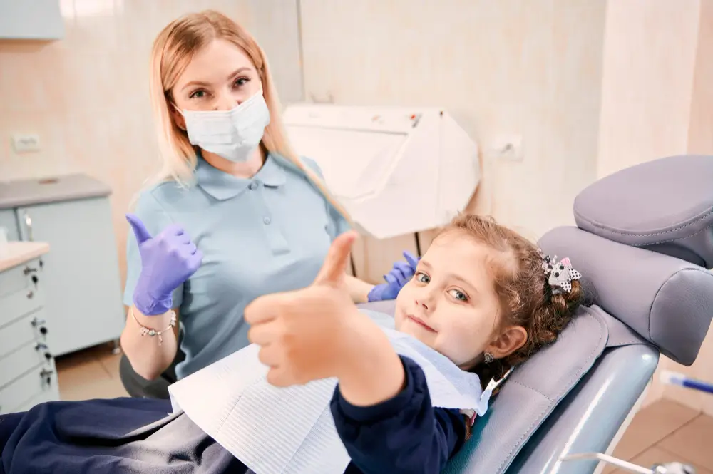 Smiling child during their first dental visit at ZPD Dental Clinic in Zionsville