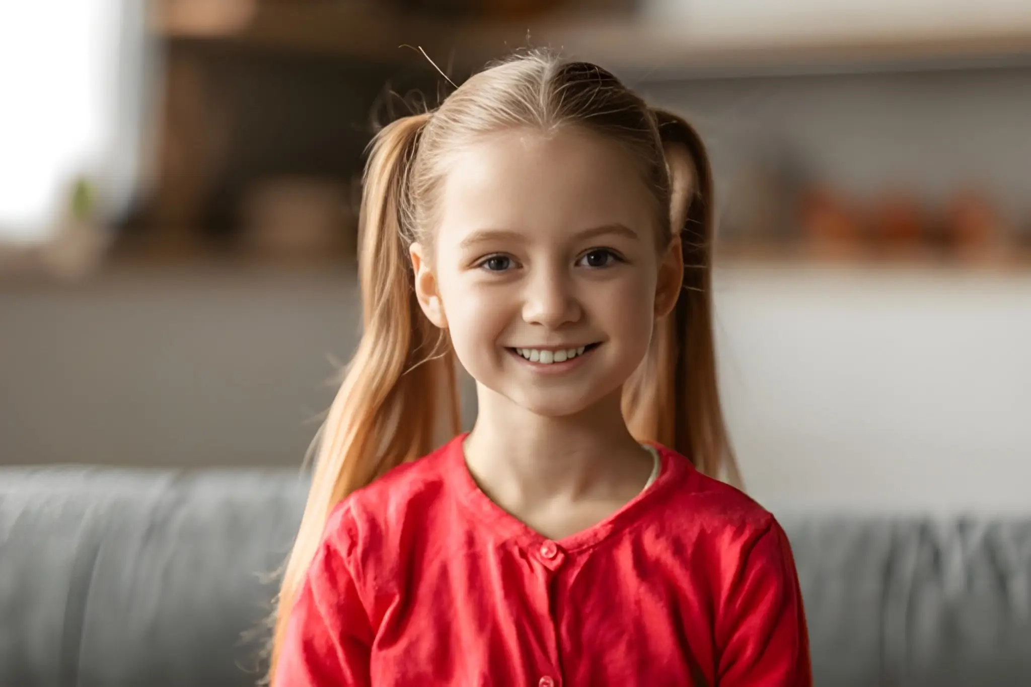 Young girl smiling confidently after her dental check-up at ZPD Dental Clinic