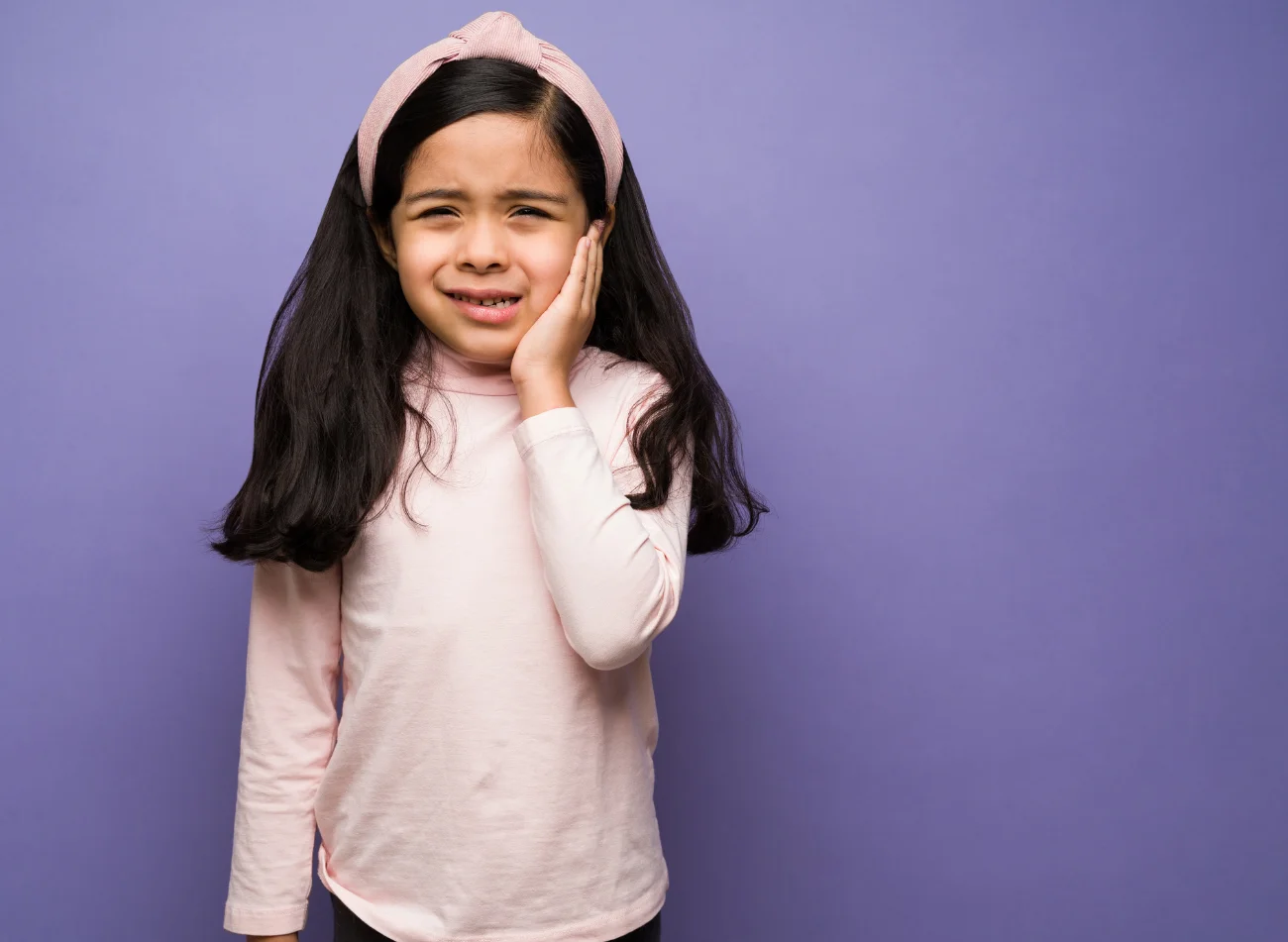 Pediatric dentist preventing cavities in children through early dental care and hygiene